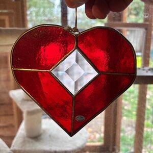 Big beautiful 😻 heart , beveled center crystal.In a sunny window its exquisite